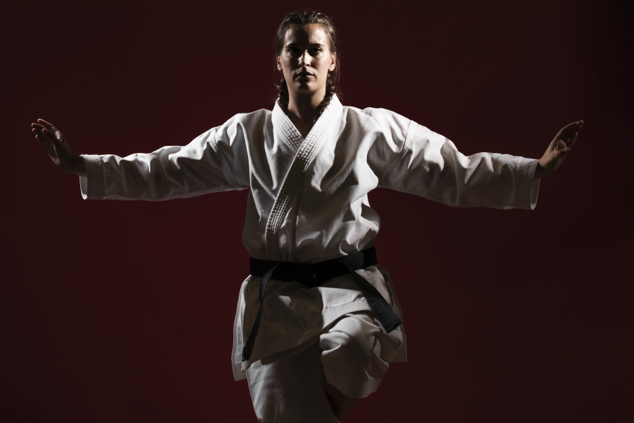 front-view-woman-white-karate-uniform