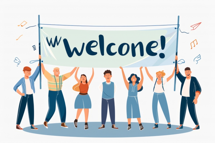 group-people-holding-up-banner-that-says-welcome