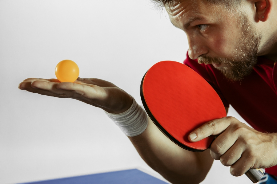 young-man-playing-table-tennis